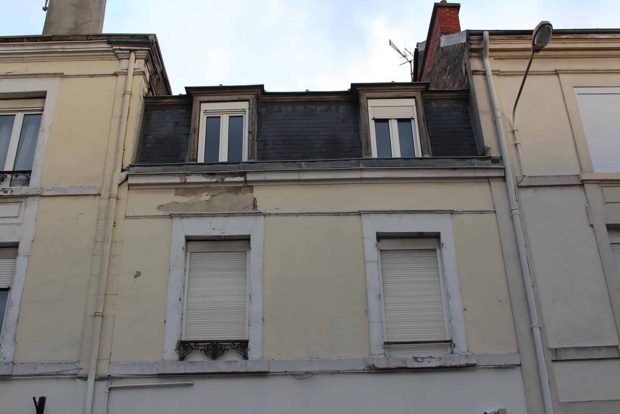 Réfection des corniches et des façades d'une bâtisse à Reims